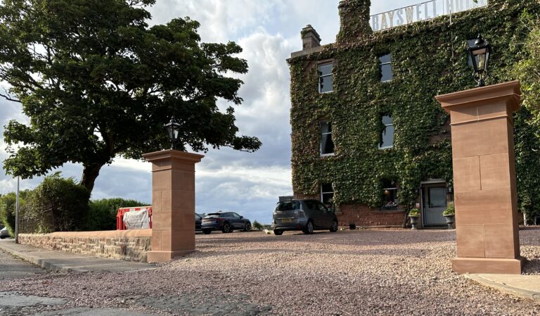 Sandstone gate pillars at the entrance to Bayswell Hotel
