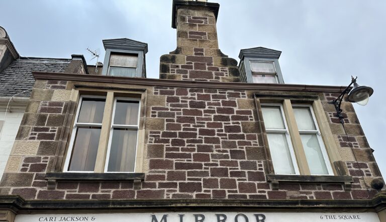 Stone frontage with two dormer windows at The Square
