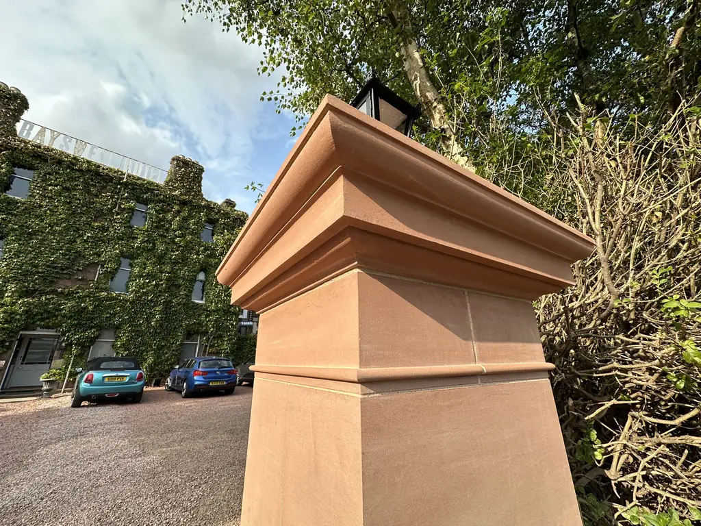 Red sandstone gate pillar at Bayswell Hotel
