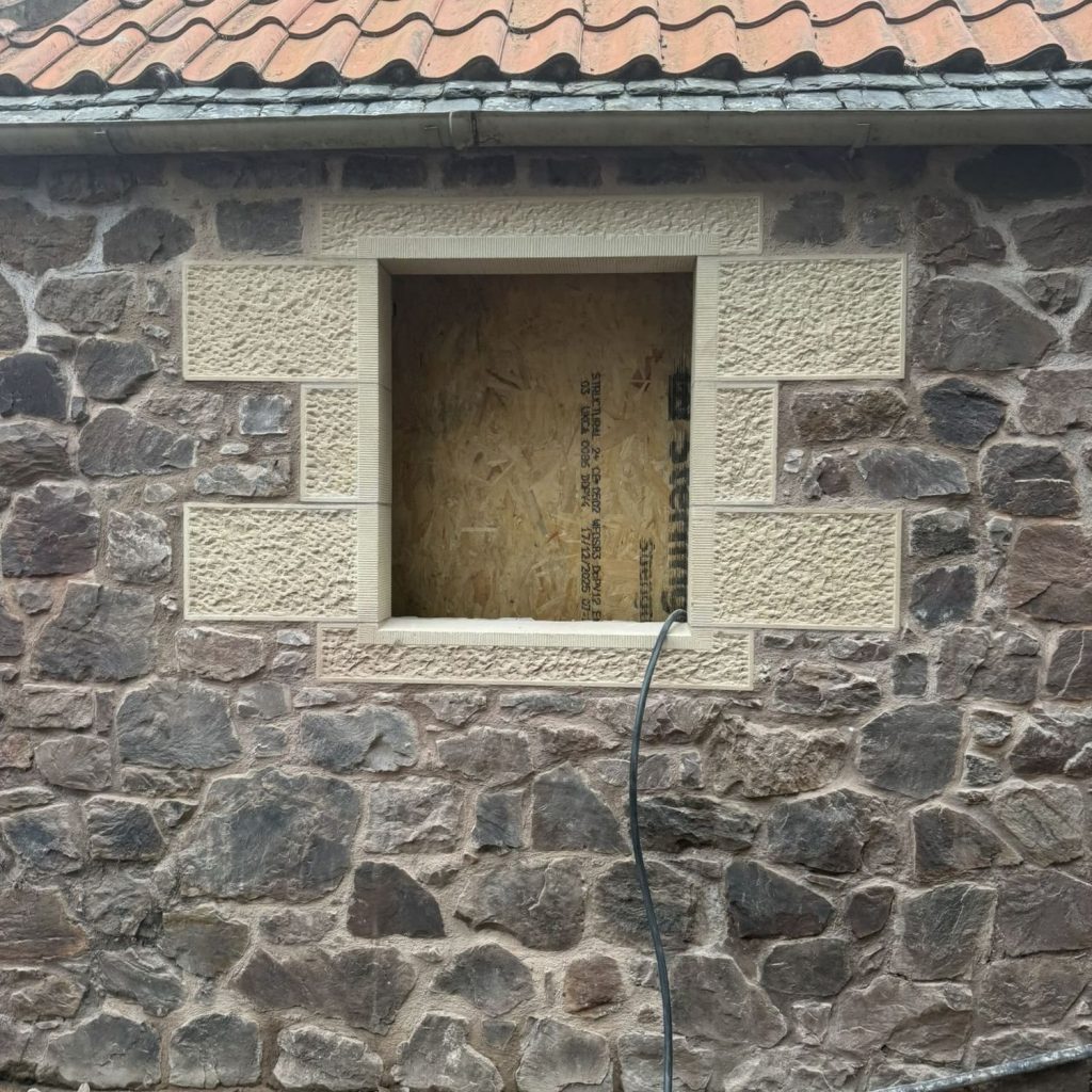 Stone wall after a new window opening was formed
